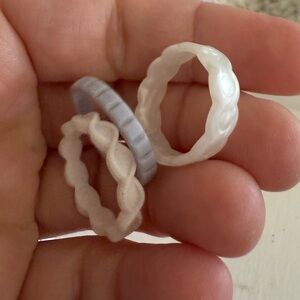 Qalo set of 3 sz 7 rings. Pale pink, purple, peal